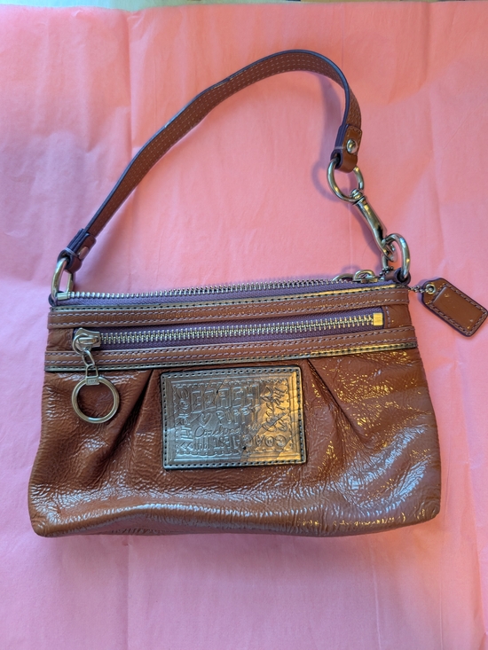 Coach Handbags - Coach Brown Patent Leather Wristlet with Silver Hardware